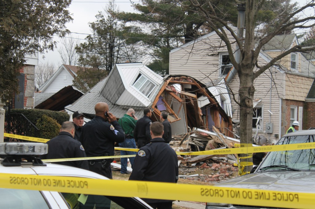 A home exploded in Hempstead on Wednesday. (Timothy Bolger/Long Island Press)