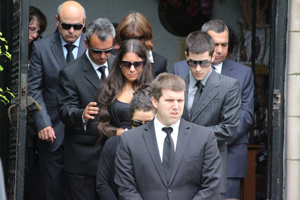 Andrea Rebello's family walking out of the church after her funeral service in Sleepy Hollow, NY. (Photo: Rashed Mian/Long Island Press)