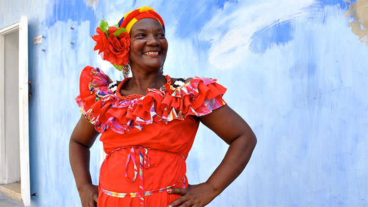 ‘Women of the World’ Unite at CW Post Art Show Michele Dragonetti took this lively photo of a festive woman in Cuba