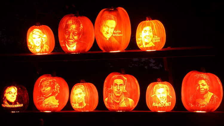 Jack 'O Lanterns depicting images of recently deceased celebrities and world figures, including Robin Williams and Nelson Mandella, are among the 5,000 carved pumpkins at Rise of the Jack 'O Lanterns (Kafel Benn)