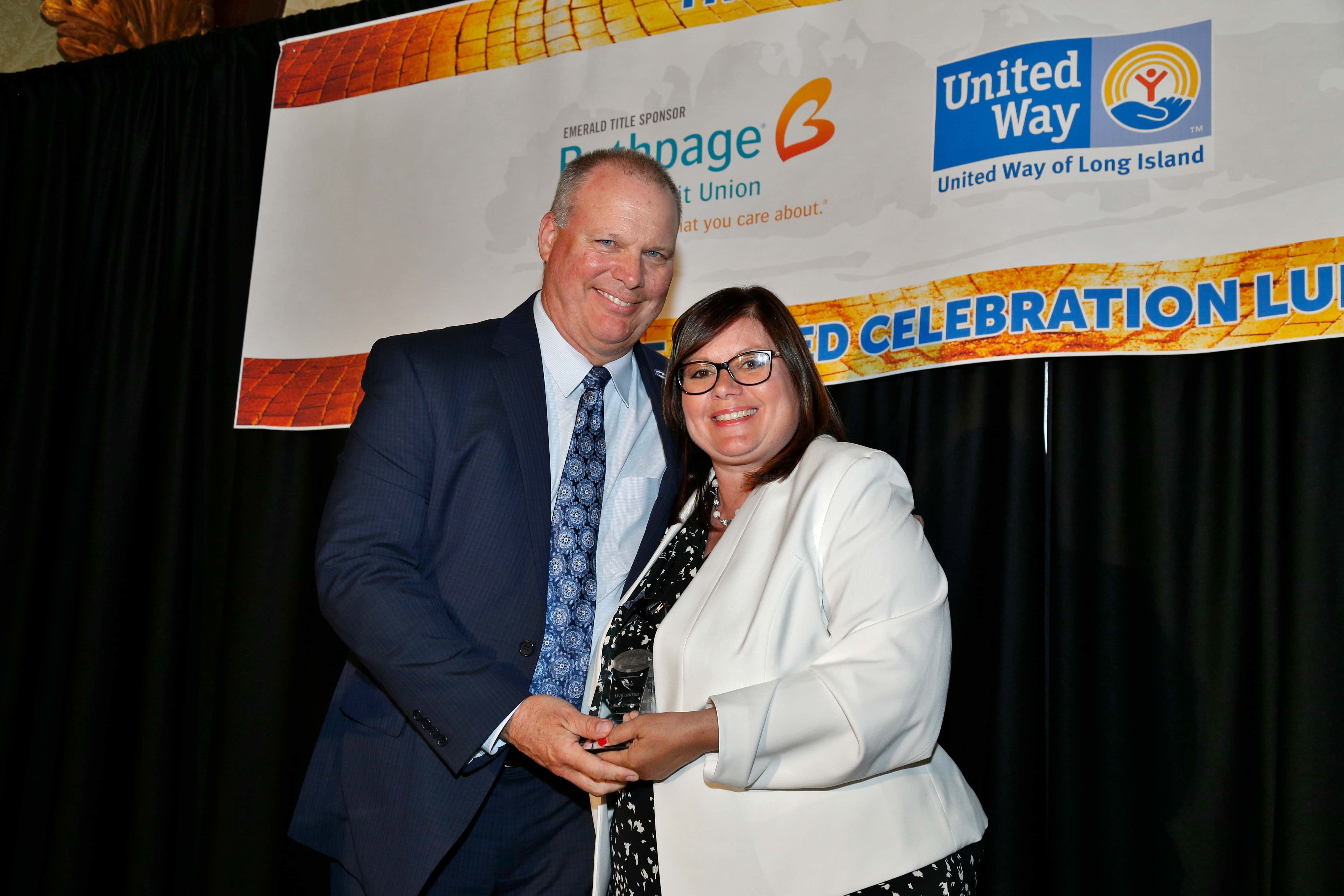 Marc Herbst with Linda Armyn, accepting award for LICA (1)