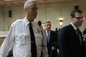 Gary Parker (middle) being escorted into courtroom on Monday. 