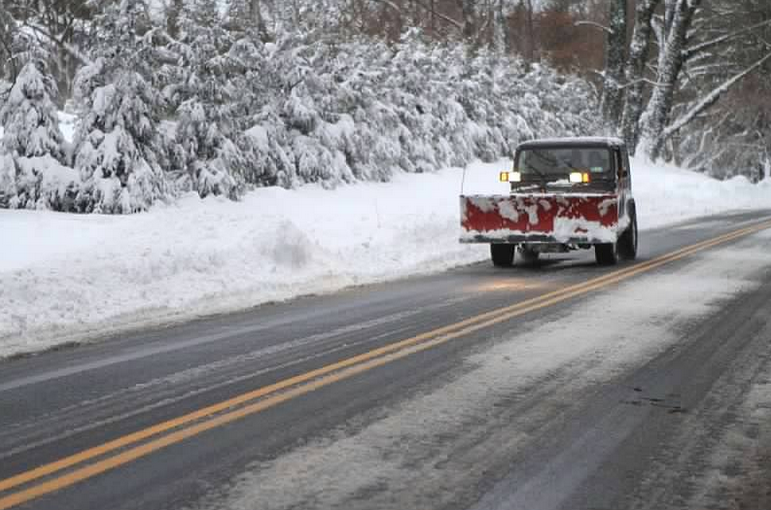 Plow truck moving through Long Island Saturday morning. (Photo credit: Michael Damm)