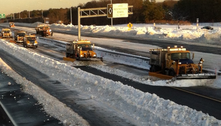Snow plows clear the Long Island Expressway in Suffolk County on Sunday, Feb. 10, 2013.