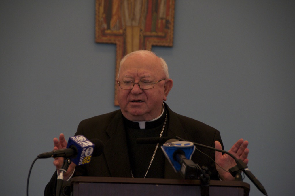 Bishop William Murphy talks to reporters about the new pope at Saint Agnes Cathedral Parish Center in Rockville Centre. (