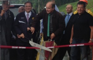 Nassau County Executive Ed Mangano cut the ribbon reopening West Shore Road in Mill Neck on Monday, June 10, 2013.