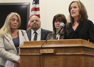 Nassau County District Attorney Kathleen Rice, right, speaks at a news conference Thursday, Oct. 31, 2013. From left are