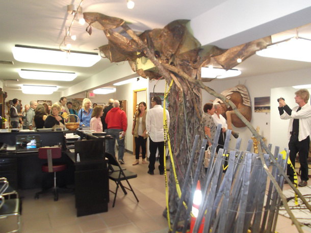 LIFE FROM DEATH: Art exhibit “A Brush With Sandy” at Studio 5404 in Massapequa featured Superstorm Sandy-inspired creations across various mediums, including this tree, representating many LI communities post-storm. (Cassidy Kammerer/Long Island Press)  