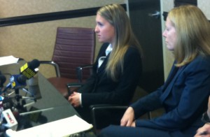 Jenny Hannigan, left, speaks to reporters with her attorney, Amy Morian