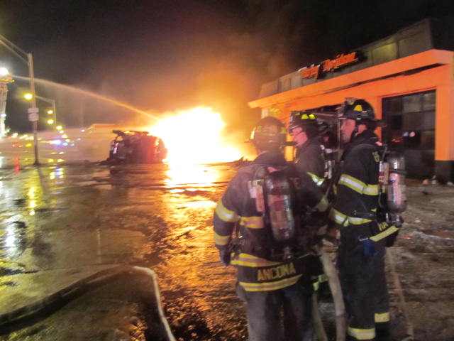 Firefighters battle a tanker truck fire Wednesday, Dec. 18, 2013 (Photo by Vincent Scaduto, Bellmore Fire Department)