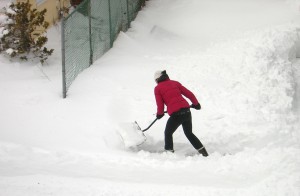 An Island Park resident digs out of the snow in February 2013. (Photo by Joe Abate)