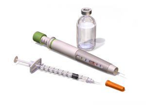 An insulin syringe and pen (Credit: Bruce Blaus)