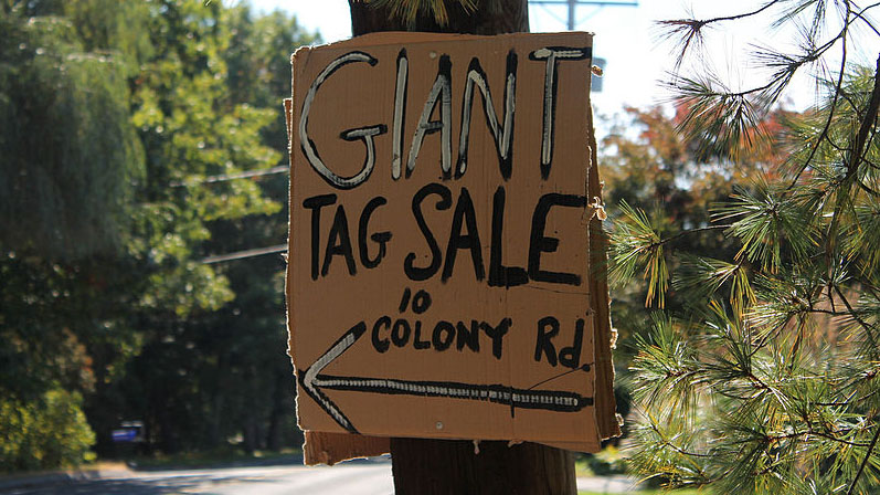 Tag sale shoppers simply can't drive by a sign like this without stopping.
