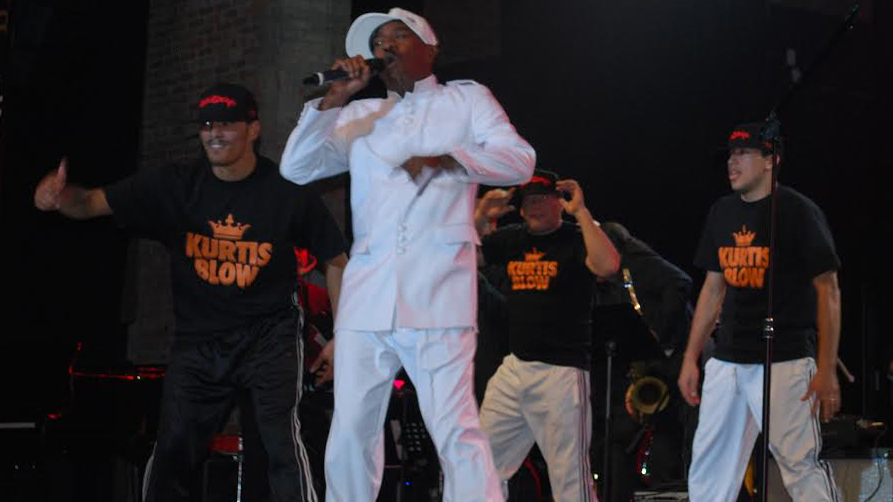 Hip hop pioneer Kurtis "Blow" Walker wows a sold-out crowd at The Paramount in Huntington Thursday, Oct. 23, 2014 with a breakdance-heavy performance of his immortal 1980 hit "The Breaks." (Christopher Twarowski / Long Island Press)