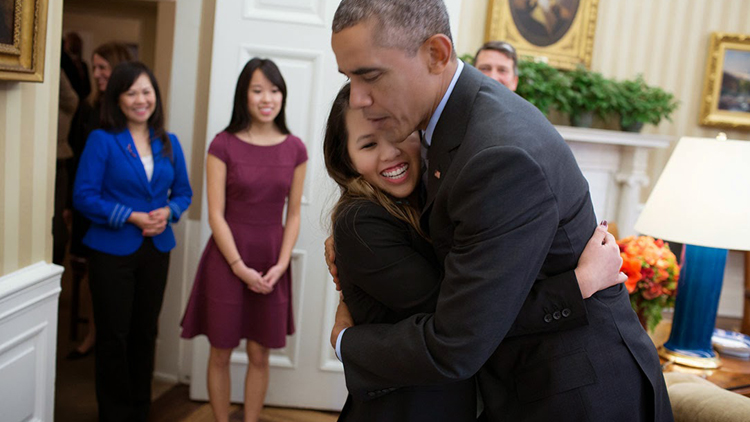 President Barack Obama greets Nina Pham, a Dallas nurse diagnosed with Ebola after caring for an infected patient in Texas, in the Oval Office, Oct. 24, 2014. Pham is virus-free after being treated at the National Institutes of Health Clinical Center in Bethesda, Md. (Official White House Photo by Pete Souza)