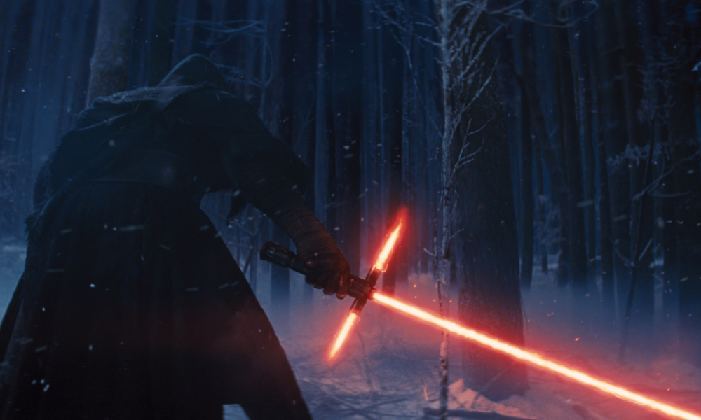 This photo provided by Disney shows, Adam Driver as Kylo Ren with his Lightsaber in a scene from the new film, "Star Wars: The Force Awakens." The movie releases in the U.S. on Dec. 18, 2015. (Film Frame/Disney/Lucasfilm via AP) ORG XMIT: CAET177