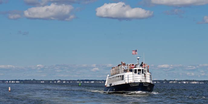 A ferry filled with passengers sails on the Great South Bay to Watch Hill on Fire Island