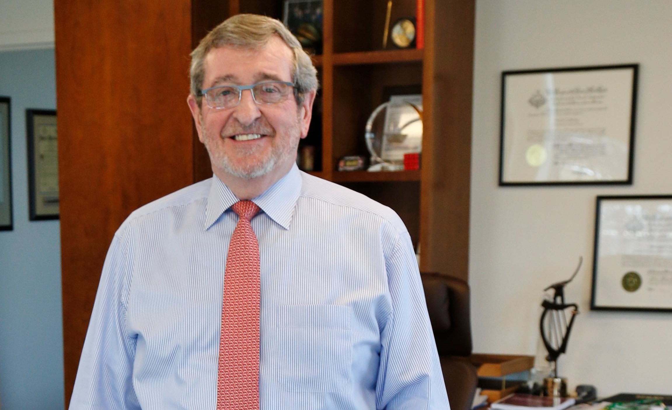 Northwell Health CEO Michael Dowling, an Irish immigrant who played hurling as a kid, keeps a hurling stick in his office. (Photo by Bob Giglione) (1)