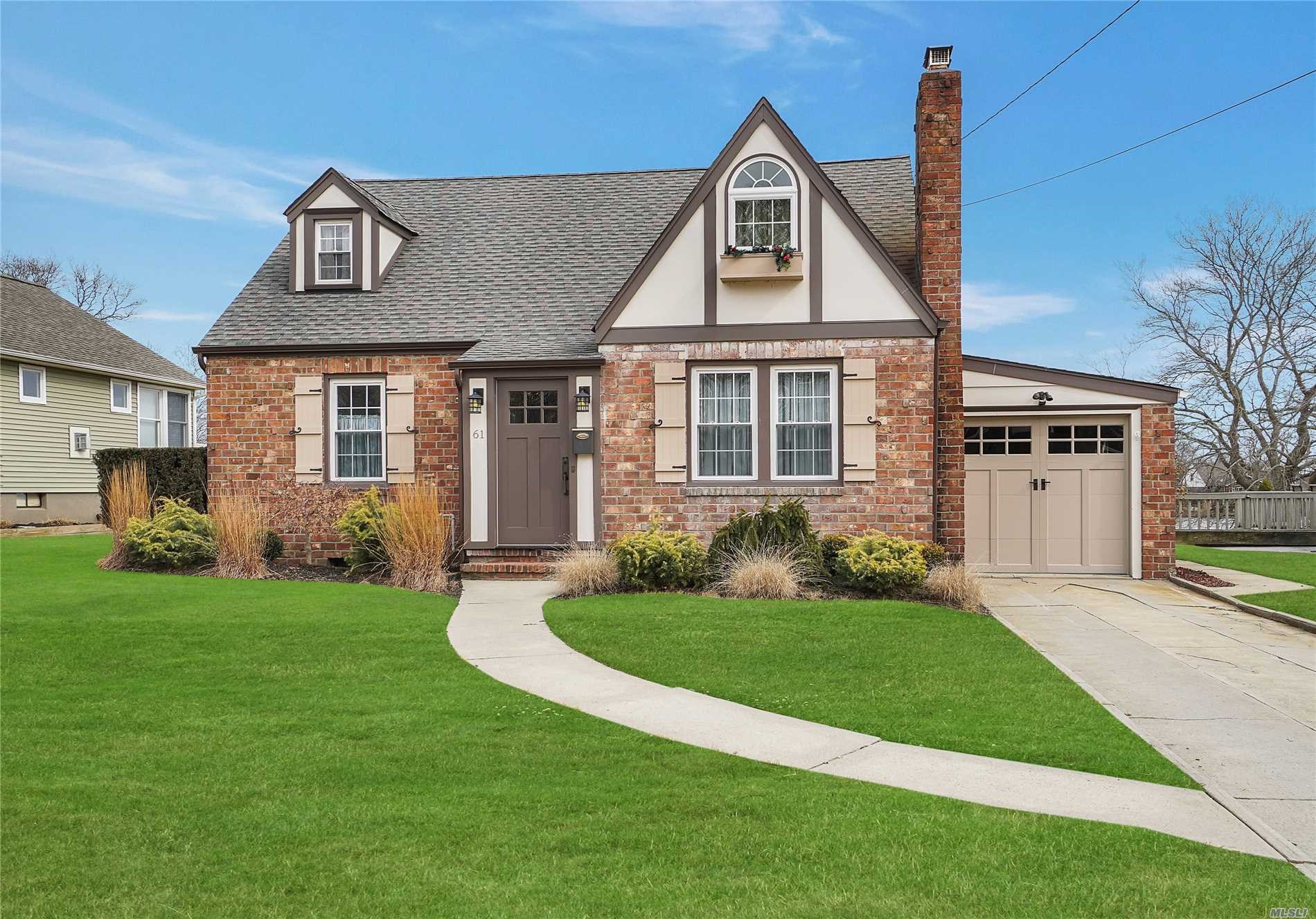 Tudoresque Waterfront Patchogue Cape Asks 495,000