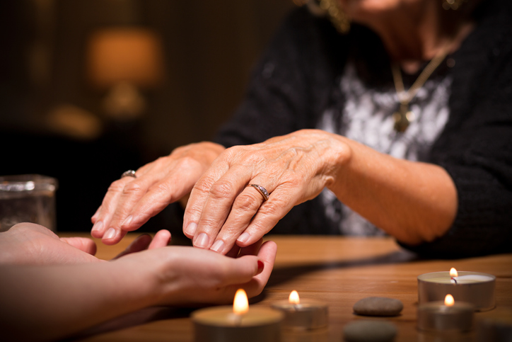 Close-up of spiritualistic seance