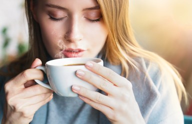 Beautiful women drink hot coffe