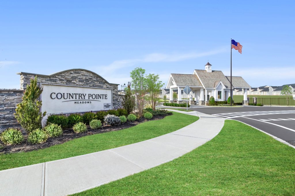 1 community entrance photo credit beechwood homes rise media country pointe meadows in yaphank 1