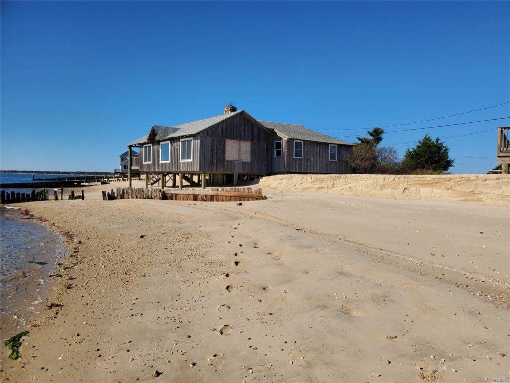Beachfront Mattituck Log Cabin Asks 1.1M