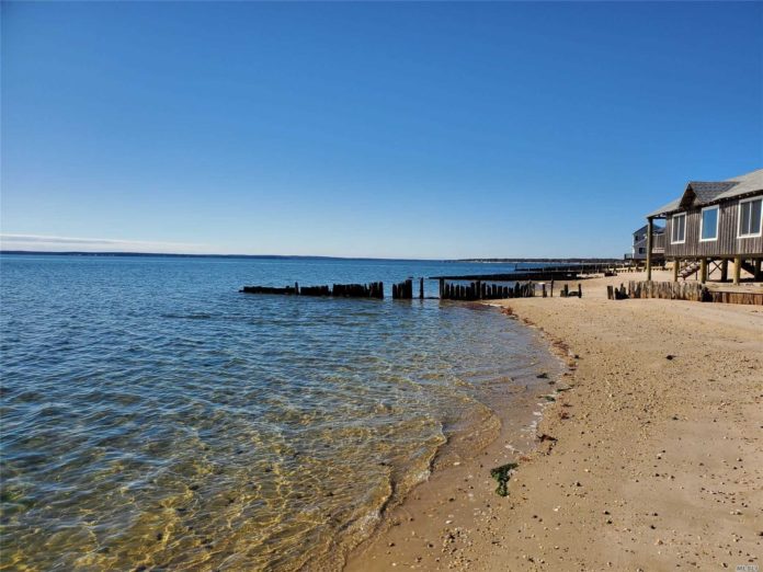 Beachfront Mattituck Log Cabin Asks 1.1M
