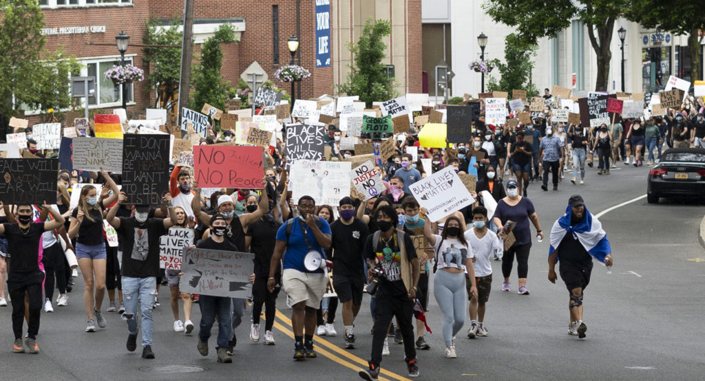 The march leaves downtown Huntington as it makes its way toward Heckscher Park (1)