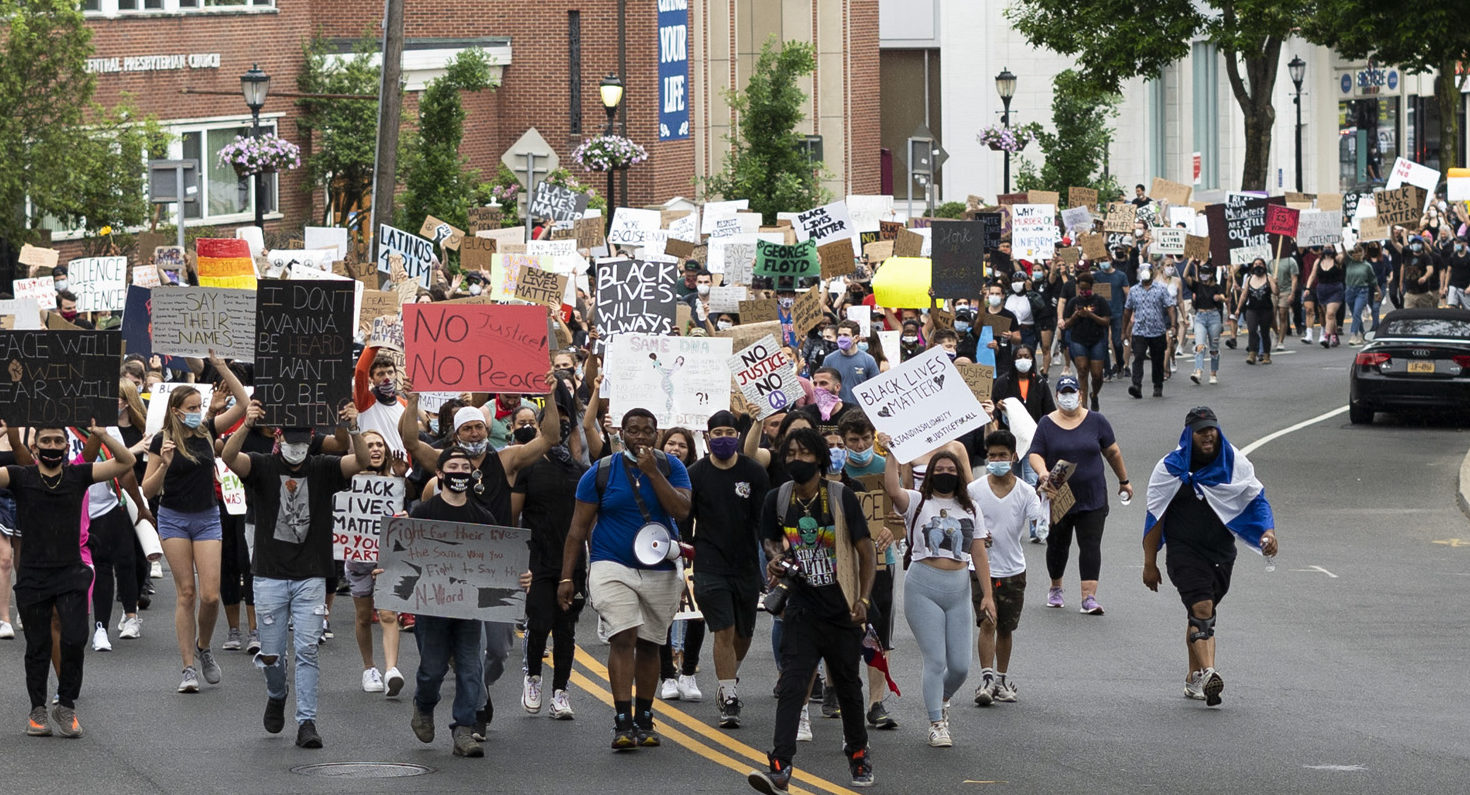 The march leaves downtown Huntington as it makes its way toward Heckscher Park (1)