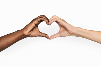 Diverse hands with love sign