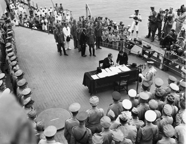 File photo of Japan’s delegation gathering to sign the formal surrender document on the U.S. Navy battleship USS Missouri in Tokyo Bay