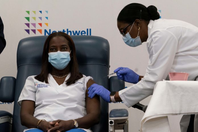 2020-12-14T153248Z_1_LYNXMPEGBD14O_RTROPTP_4_HEALTH-CORONAVIRUS-VACCINES (1) inauguration
