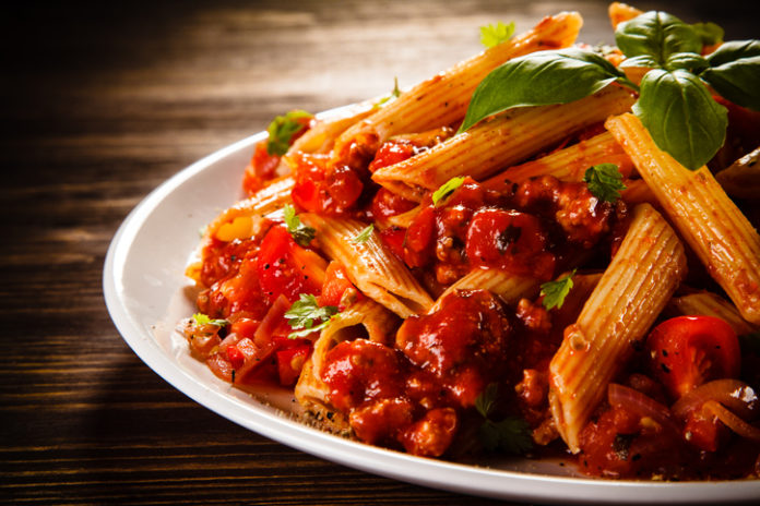 Pasta with meat, tomato sauce and vegetables