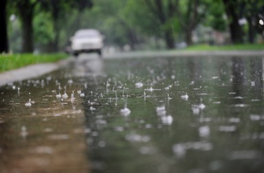 View of the street surface during rain.