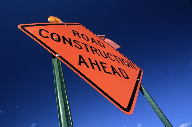 Road construction sign, low angle view