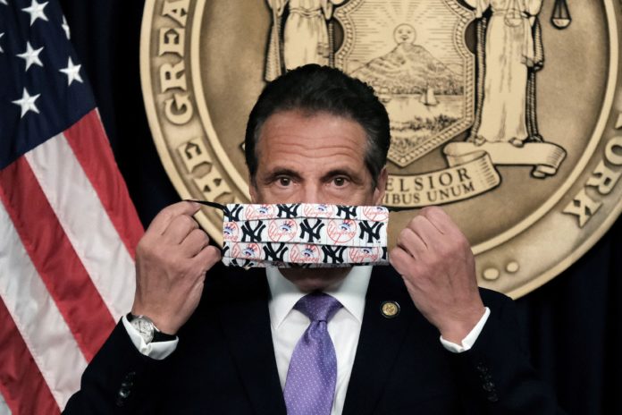 New York Governor Andrew Cuomo holds a news conference in New York City cdc mask