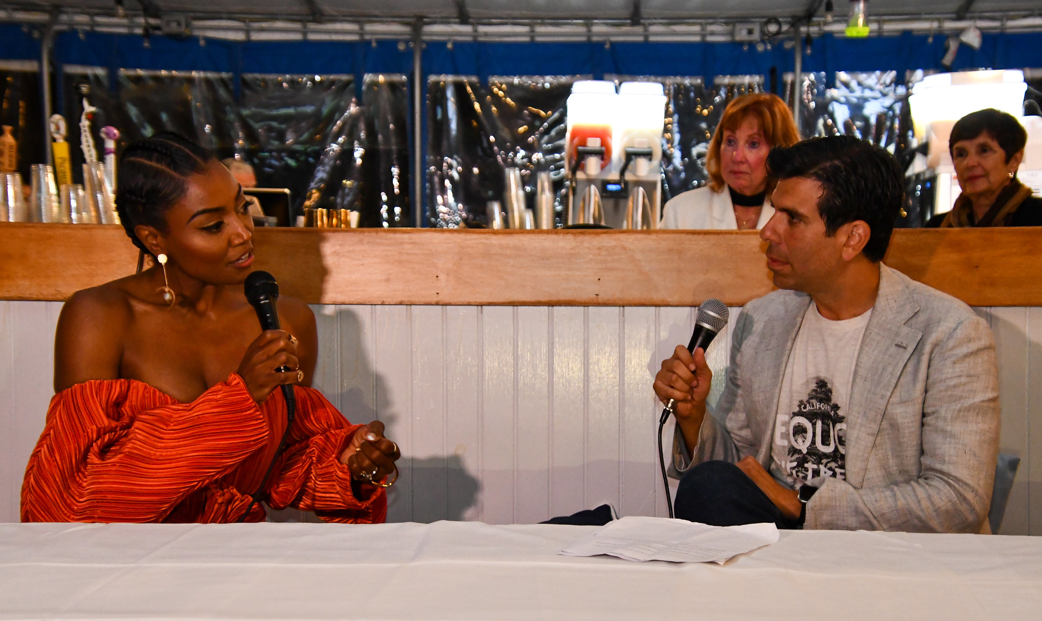 Image 14 Patina Miller having a formal converstation with Elias Plagianos