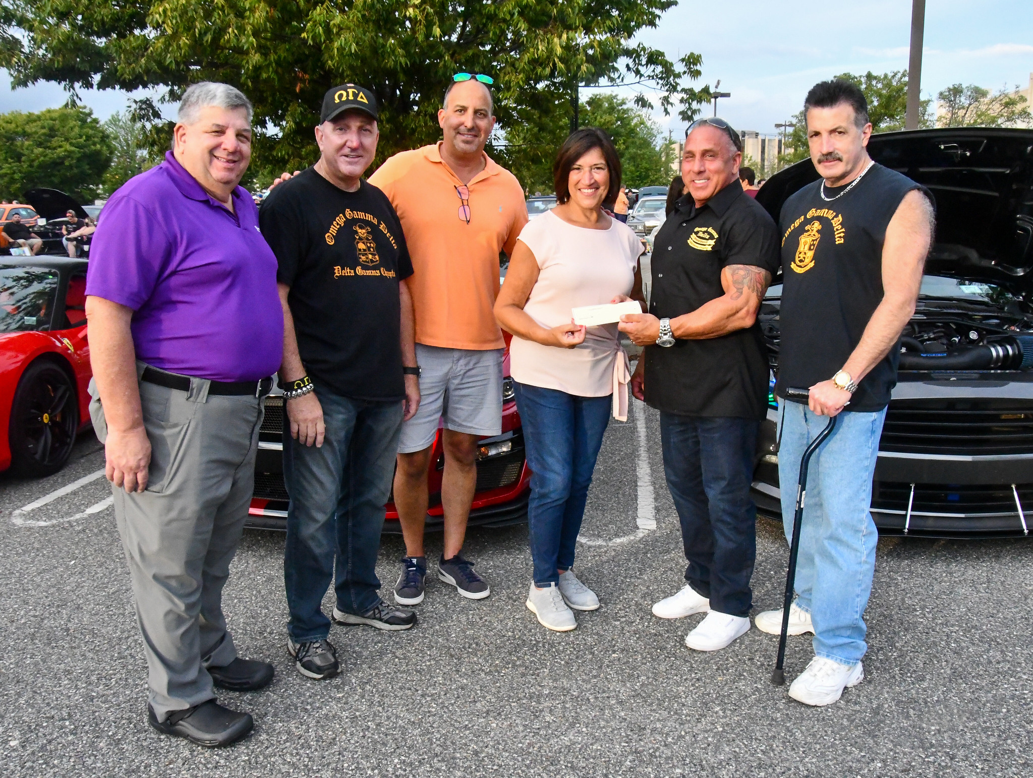 Image 2 Paul Magro Tom Galati Terrie Magro with members of Omega Delta Kappa Nassau County Chapter as they present a check to the Foundation.