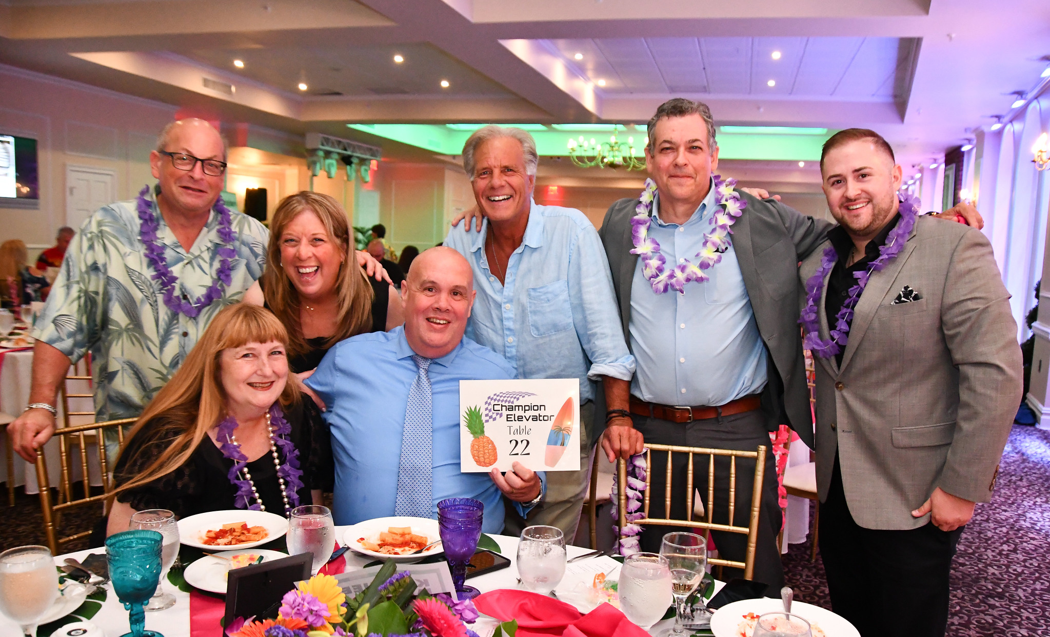 Image 5 Champion Elevator Steven Tilchen sitting Sharon Peach Paul Peach Back Row Linda Tilchen Mike Zenick Marc Peper Joe Lore