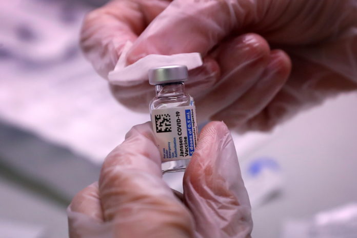 People receive vaccinations for the coronavirus disease (COVID-19) at subway station in Queens borough of New York City second shot