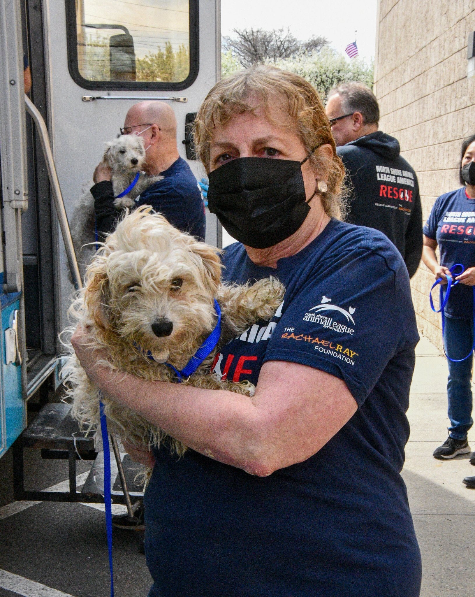 Image 17 Leslee Rabb with a rescue puppy