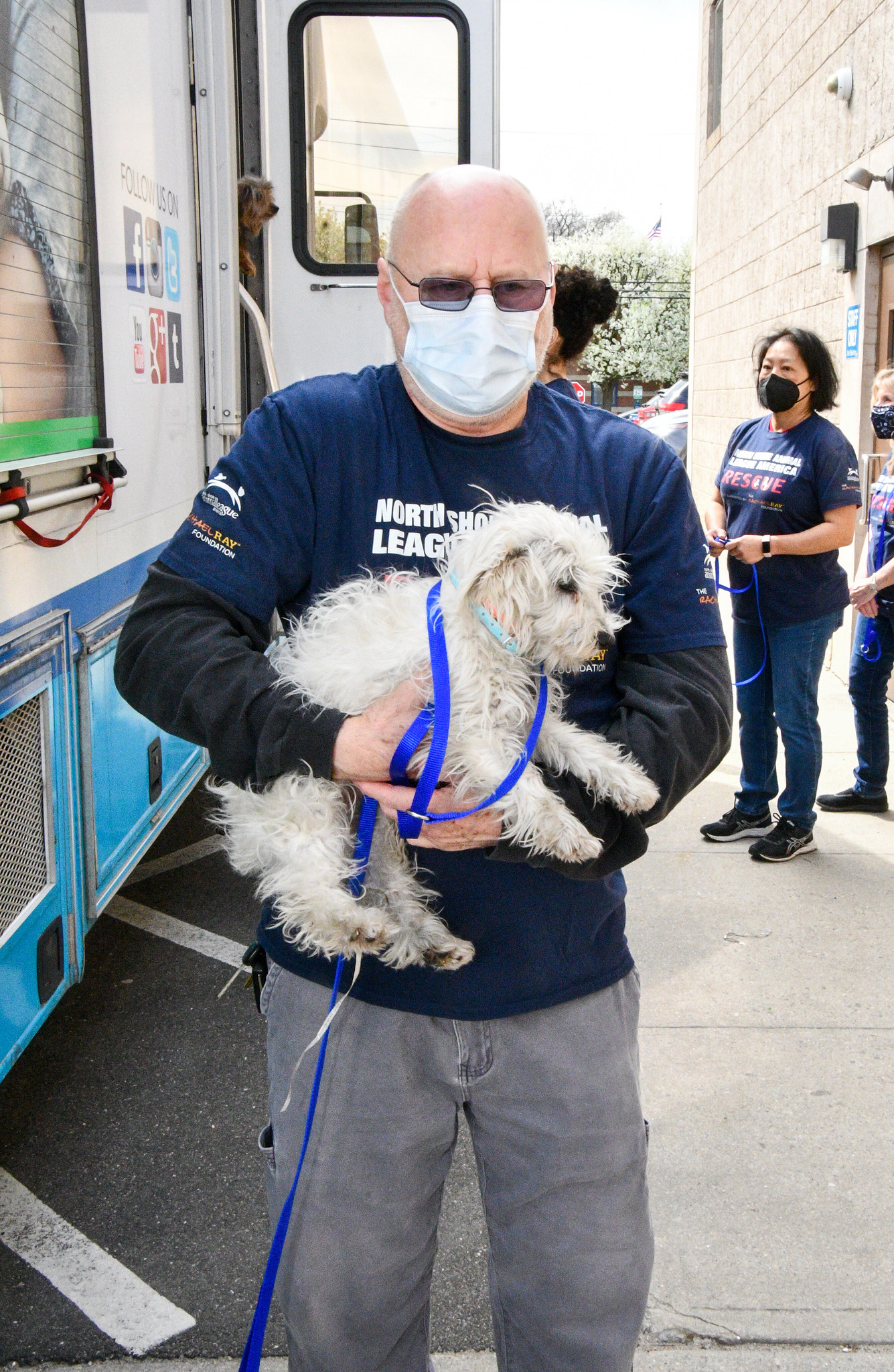 Image 6 Tom Audette with a rescue puppy