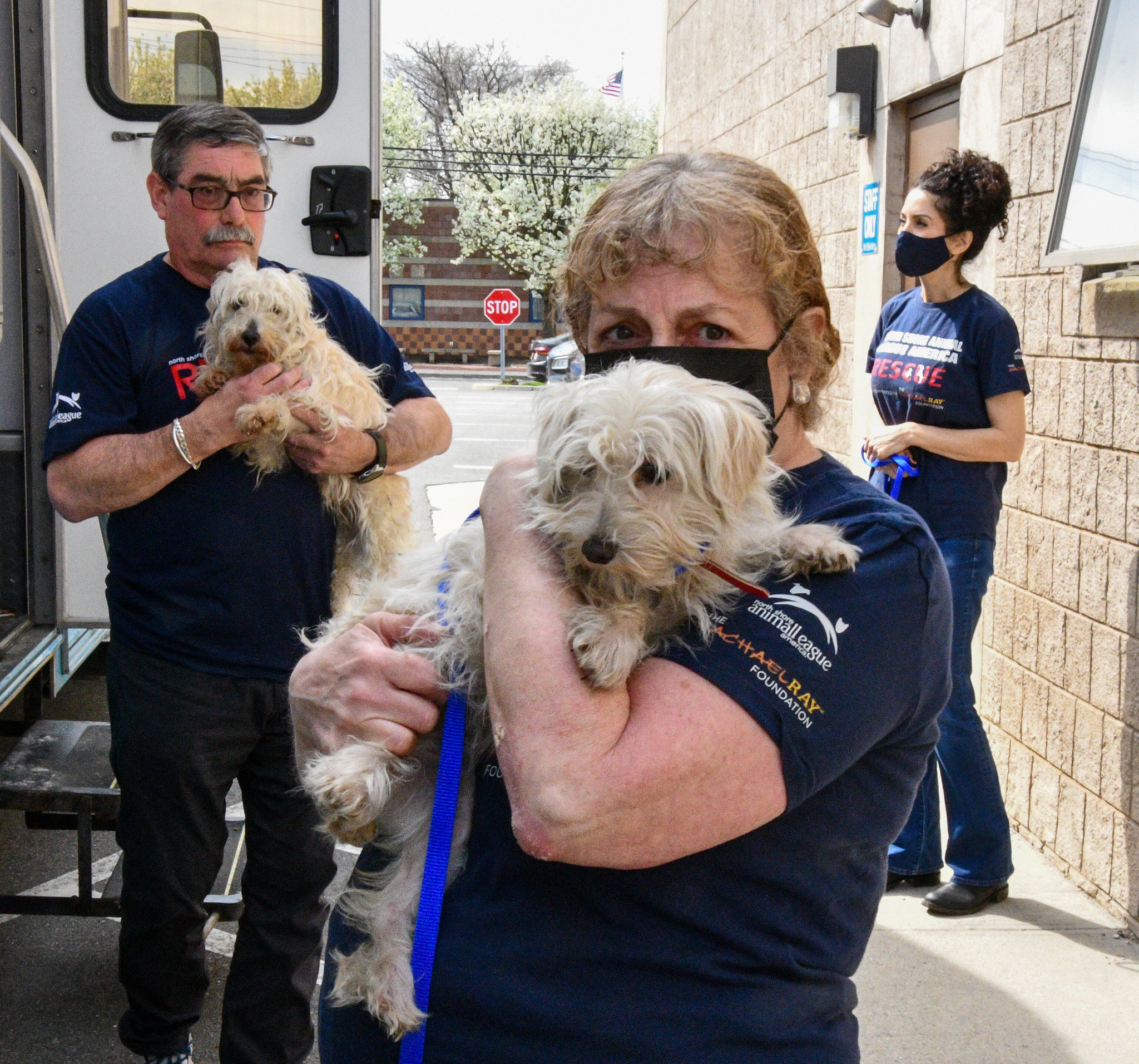 Image 9 Leslee Rabb with a rescue puppy