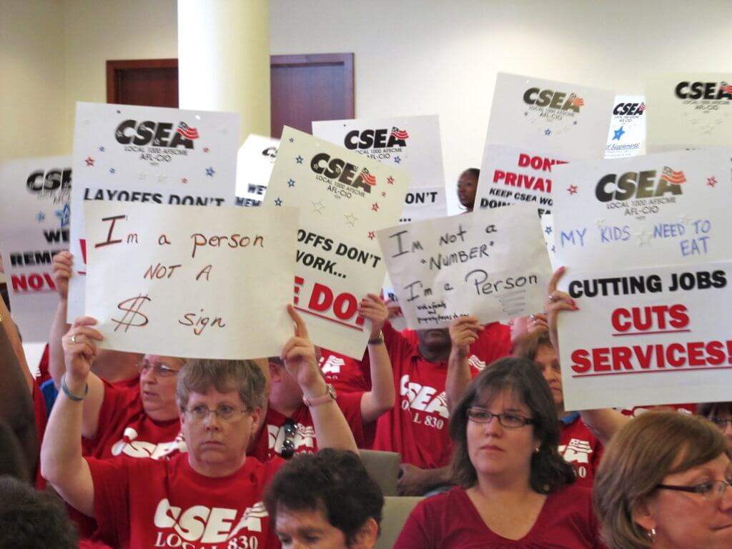 CSEA workers protesting the layoffs.