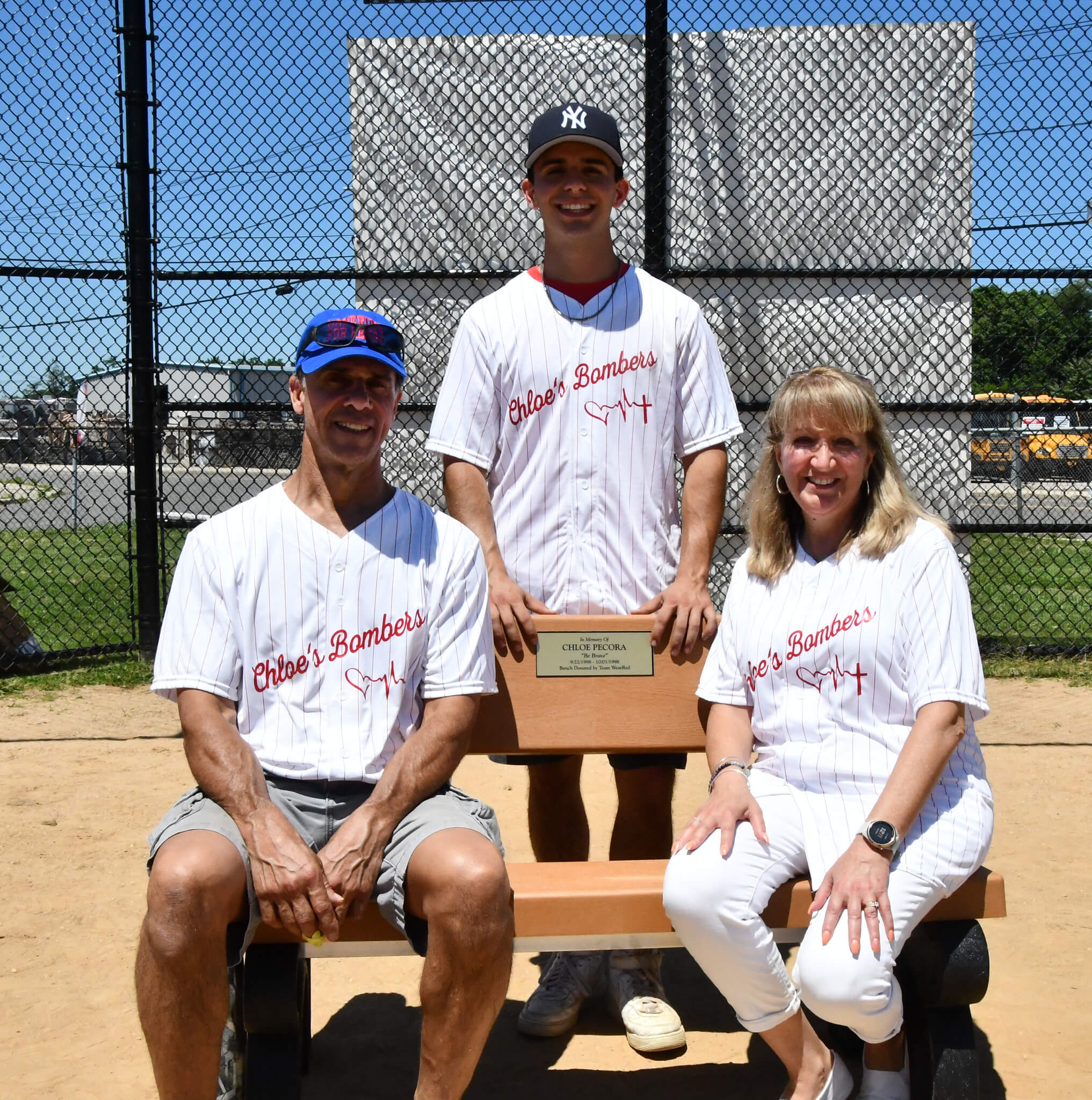 Image 5 Lenny Pecor Keith Pecora Jackie Pecora sitting on the bench named after their daughter Chloe