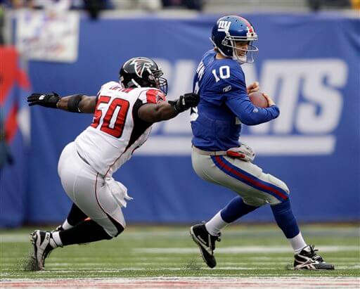 Eli Manning,  Curtis Lofton