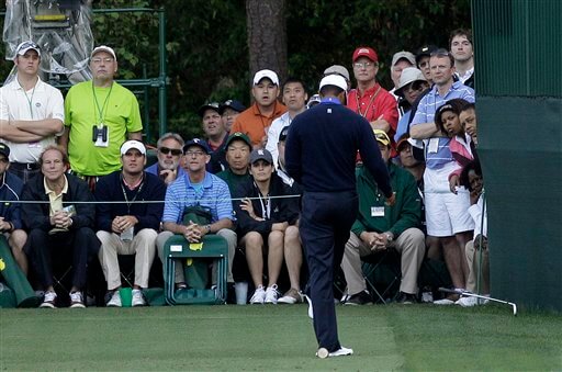 Tiger Woods kicks golf club