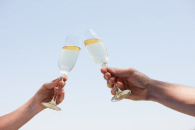Couple drinking Champagne and toasting