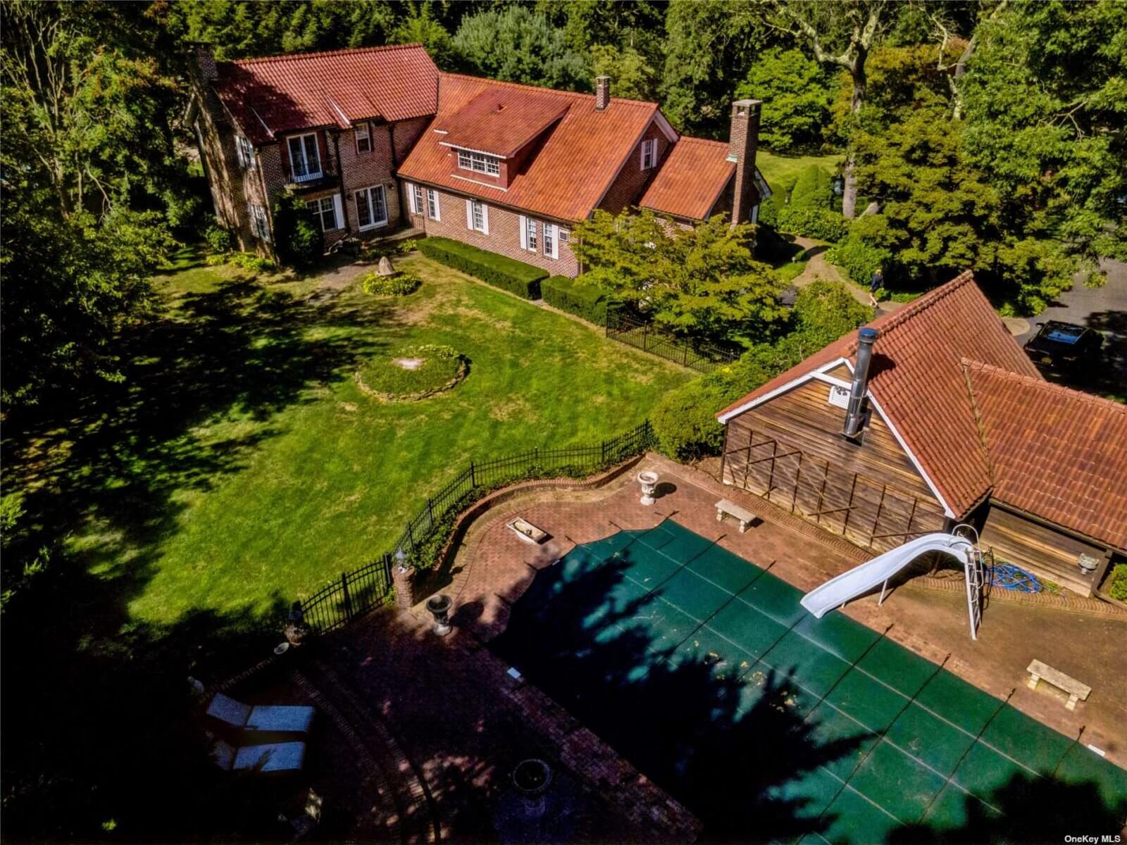 Gated Brick Colonial Estate in Greenlawn Asks 1.2M